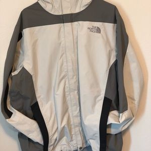 Zip up ski jacket with inside detachable fleece.